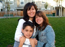 Mother and children at housing community